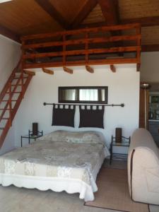Postel nebo postele na pokoji v ubytování Chambre d'hôtes "La Bastide des Eucalyptus"