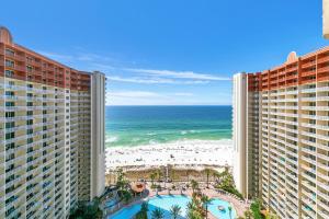 a view of the beach from the balcony of a resort at Shores of Panama 1816 in Panama City Beach
