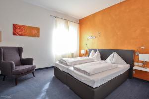 Voodi või voodid majutusasutuse Stadthotel Gürtler toas
