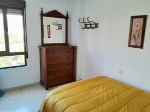 Postel nebo postele na pokoji v ubytování Casa Adriana con parking Room in shared apartment