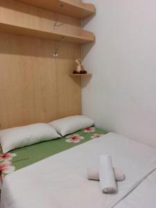 Postel nebo postele na pokoji v ubytování #Punto FM 2#