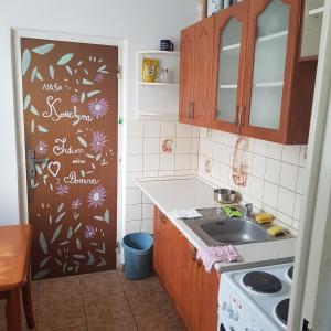 Kuchyň nebo kuchyňský kout v ubytování Apartman Trajan