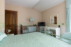 Postel nebo postele na pokoji v ubytování B&B Villa Dei Desideri