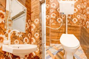 Ванная комната в OYO Muchhad 75 Hotel
