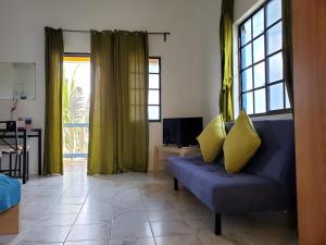 Un lugar para sentarse en Bay View Apartments Canouan Island