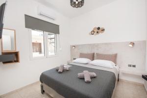 Postel nebo postele na pokoji v ubytování Casa di Hari