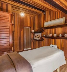 Llit o llits en una habitació de Neolink Barra da Tijuca