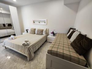 מיטה או מיטות בחדר ב-Casa Skyline a Ravello
