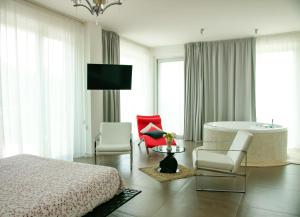 Voodi või voodid majutusasutuse Max Luxury Suite - Servizio Spiaggia Inclusa toas