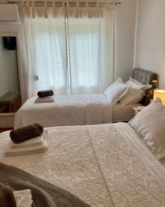 Postel nebo postele na pokoji v ubytování Apartments Curnić