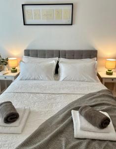Postel nebo postele na pokoji v ubytování Apartments Curnić