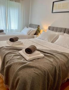 Postel nebo postele na pokoji v ubytování Apartments Curnić