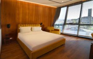Ένα ή περισσότερα κρεβάτια σε δωμάτιο στο Nirvana Resort & Spa