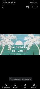 a banner with a picture of palm trees at La posada del amor in Máncora
