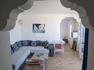 Ліжко або ліжка в номері Villa vue mer Mirleft - ménage et Cuisinière à mi-temps