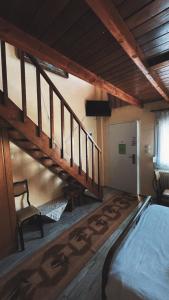 Rúm í herbergi á Olympiades Rooms Litóchoro