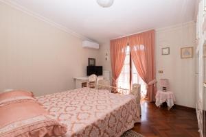 Postel nebo postele na pokoji v ubytování B&B Villa Dei Desideri