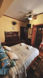 Rúm í herbergi á Olympiades Rooms Litóchoro
