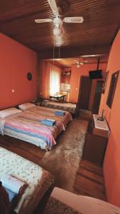 Rúm í herbergi á Olympiades Rooms Litóchoro