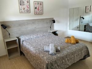 Katil atau katil-katil dalam bilik di Casa rural Daisamar