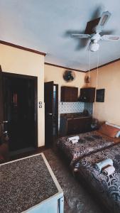 Rúm í herbergi á Olympiades Rooms Litóchoro