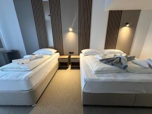 Letto o letti in una camera di Hotel Suljovic