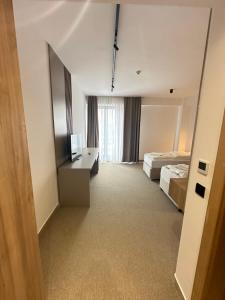 Letto o letti in una camera di Hotel Suljovic