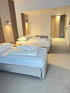 Letto o letti in una camera di Hotel Suljovic