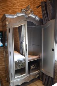 Un pat sau paturi într-o cameră la Duplex/ Appart hotel