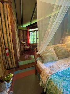 Letto o letti in una camera di Cocoa Cottage