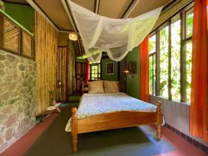 Letto o letti in una camera di Cocoa Cottage