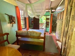 Letto o letti in una camera di Cocoa Cottage
