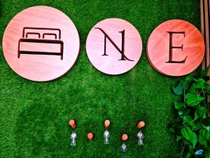 a group of people standing in the grass with the word end at B&B ONE in Catania