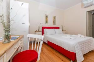 Postel nebo postele na pokoji v ubytování VAP Suites