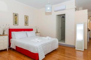 Postel nebo postele na pokoji v ubytování VAP Suites