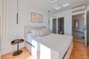 Posteľ alebo postele v izbe v ubytovaní Villa Magnolia