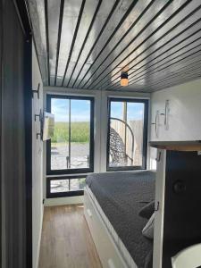 Postel nebo postele na pokoji v ubytování Container