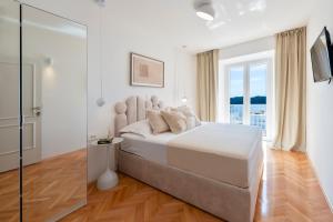 Posteľ alebo postele v izbe v ubytovaní Villa Magnolia + 37 fotografií