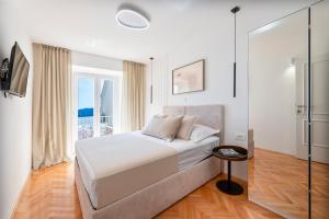 Posteľ alebo postele v izbe v ubytovaní Villa Magnolia