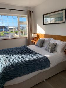 Katil atau katil-katil dalam bilik di Carranross Accommodation