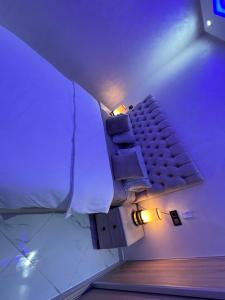 Een bed of bedden in een kamer bij Appartement Wow