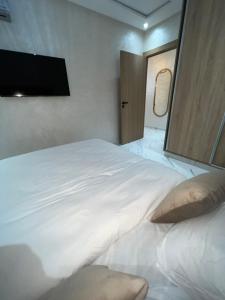 Een bed of bedden in een kamer bij Appartement Wow