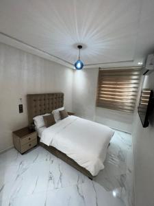 Een bed of bedden in een kamer bij Appartement Wow