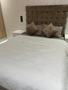 Een bed of bedden in een kamer bij Appartement Wow