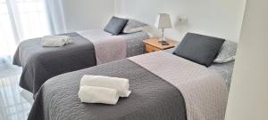 Postel nebo postele na pokoji v ubytování Luxury apartment in the heart of Moraira & 200mtrs from the sea