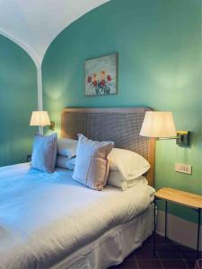 Ένα ή περισσότερα κρεβάτια σε δωμάτιο στο Terrazza Bellavista Suite