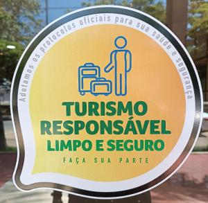 ein Zeichen für das Tuinmoremo, das sich wieder erholt hat in der Unterkunft Trip Hotel Ubá in Ubá