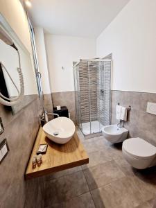 Koupelna v ubytování Marebed Apartments & Rooms + 37 fotografií