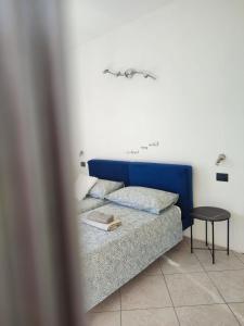 Un ou plusieurs lits dans un hébergement de l'établissement Meraviglioso appartamento Malva 1