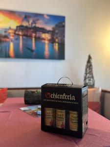 a box of beer sitting on top of a table at Haus mit Pool und Panoramablick in Hirschaid